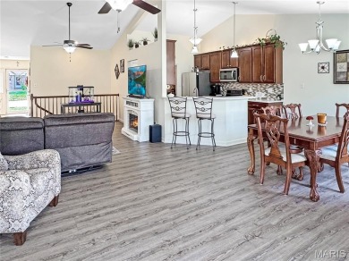 This luxury villa features an open floor plan boasting vaulted on Birch Creek Golf Club in Missouri - for sale on GolfHomes.com, golf home, golf lot