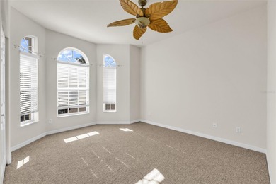 Experience the Florida lifestyle at its finest in this on Kings Gate Golf Club in Florida - for sale on GolfHomes.com, golf home, golf lot