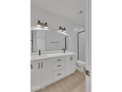 Welcome home to this stylish 4-bedroom, 3-bath residence on Emerald Springs Golf Course in Texas - for sale on GolfHomes.com, golf home, golf lot