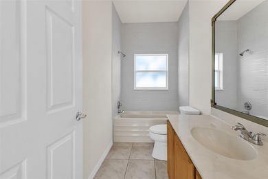 Experience the Florida lifestyle at its finest in this on Kings Gate Golf Club in Florida - for sale on GolfHomes.com, golf home, golf lot