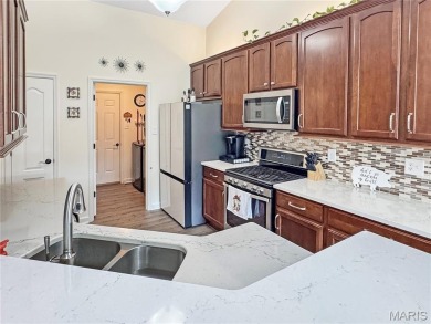 This luxury villa features an open floor plan boasting vaulted on Birch Creek Golf Club in Missouri - for sale on GolfHomes.com, golf home, golf lot