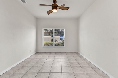 Experience the Florida lifestyle at its finest in this on Kings Gate Golf Club in Florida - for sale on GolfHomes.com, golf home, golf lot