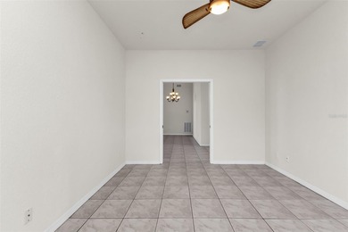 Experience the Florida lifestyle at its finest in this on Kings Gate Golf Club in Florida - for sale on GolfHomes.com, golf home, golf lot