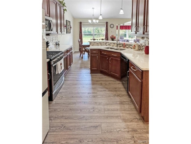This luxury villa features an open floor plan boasting vaulted on Birch Creek Golf Club in Missouri - for sale on GolfHomes.com, golf home, golf lot