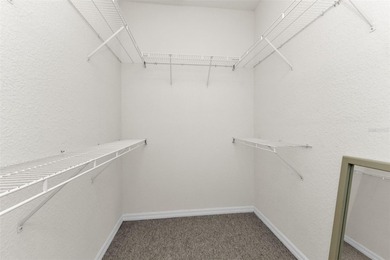 Experience the Florida lifestyle at its finest in this on Kings Gate Golf Club in Florida - for sale on GolfHomes.com, golf home, golf lot