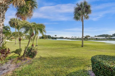 GROUND LEVEL CONDO WITH STUNNING LAKE & GOLF VIEWS Discover on Atlantis Golf Club in Florida - for sale on GolfHomes.com, golf home, golf lot