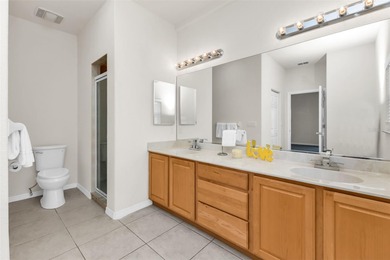 Experience the Florida lifestyle at its finest in this on Kings Gate Golf Club in Florida - for sale on GolfHomes.com, golf home, golf lot