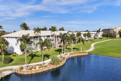 GROUND LEVEL CONDO WITH STUNNING LAKE & GOLF VIEWS Discover on Atlantis Golf Club in Florida - for sale on GolfHomes.com, golf home, golf lot