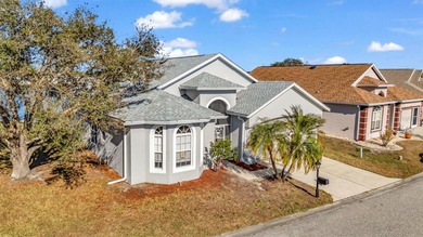 Experience the Florida lifestyle at its finest in this on Kings Gate Golf Club in Florida - for sale on GolfHomes.com, golf home, golf lot