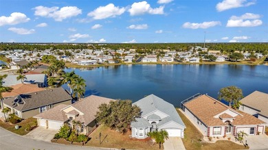 Experience the Florida lifestyle at its finest in this on Kings Gate Golf Club in Florida - for sale on GolfHomes.com, golf home, golf lot