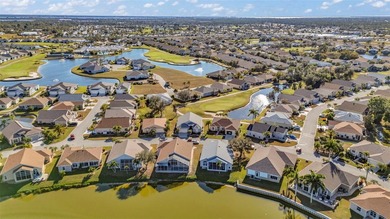 Experience the Florida lifestyle at its finest in this on Kings Gate Golf Club in Florida - for sale on GolfHomes.com, golf home, golf lot