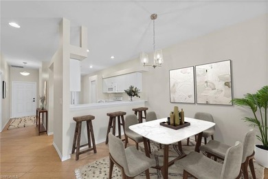 Enjoy peaceful lake and golf course views from this beautifully on Stoneybrook Golf Club in Florida - for sale on GolfHomes.com, golf home, golf lot