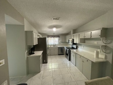 This lovely manufactured home is on leased land. Age 55+ and pet on Pine Lakes Country Club in Florida - for sale on GolfHomes.com, golf home, golf lot