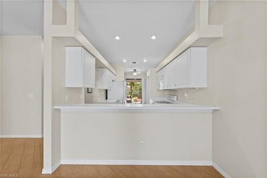 Enjoy peaceful lake and golf course views from this beautifully on Stoneybrook Golf Club in Florida - for sale on GolfHomes.com, golf home, golf lot