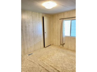 Whether you're investing or trying to secure a piece of sunshine on Barefoot Bay Golf Course in Florida - for sale on GolfHomes.com, golf home, golf lot