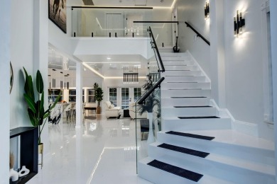Contemporary renovation just completed on this well located on The Wanderers Club in Florida - for sale on GolfHomes.com, golf home, golf lot