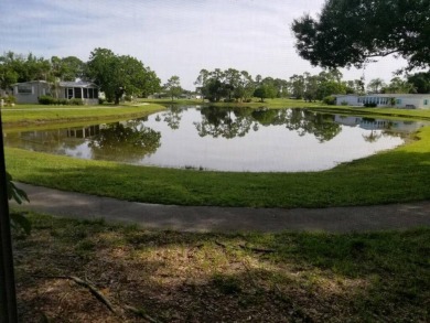 This lovely manufactured home is on leased land. Age 55+ and pet on Pine Lakes Country Club in Florida - for sale on GolfHomes.com, golf home, golf lot