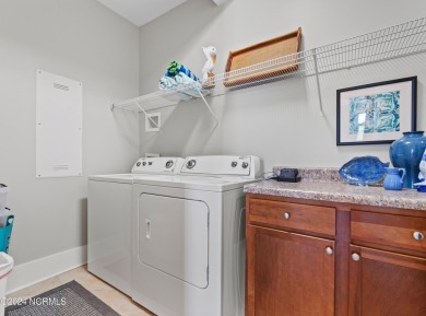 Price just reduced on this stunning Harborwalk condo which on Members Club At St. James Plantation in North Carolina - for sale on GolfHomes.com, golf home, golf lot