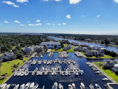 Price just reduced on this stunning Harborwalk condo which on Members Club At St. James Plantation in North Carolina - for sale on GolfHomes.com, golf home, golf lot