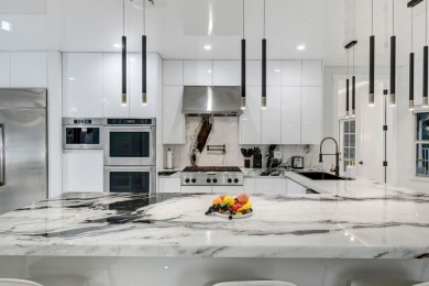 Contemporary renovation just completed on this well located on The Wanderers Club in Florida - for sale on GolfHomes.com, golf home, golf lot