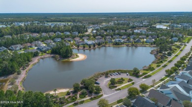 Nestled in the highly sought-after Brunswick Forest community on Cape Fear National At Brunswick Forest in North Carolina - for sale on GolfHomes.com, golf home, golf lot