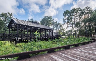 Price just reduced on this stunning Harborwalk condo which on Members Club At St. James Plantation in North Carolina - for sale on GolfHomes.com, golf home, golf lot