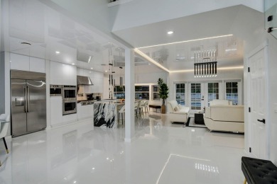 Contemporary renovation just completed on this well located on The Wanderers Club in Florida - for sale on GolfHomes.com, golf home, golf lot