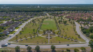 Nestled in the highly sought-after Brunswick Forest community on Cape Fear National At Brunswick Forest in North Carolina - for sale on GolfHomes.com, golf home, golf lot