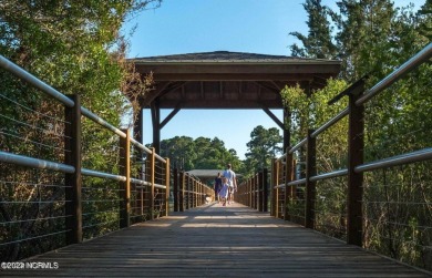 Price just reduced on this stunning Harborwalk condo which on Members Club At St. James Plantation in North Carolina - for sale on GolfHomes.com, golf home, golf lot