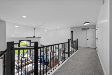 Step inside to a spacious great room featuring stunning on Golf Club of Dublin in Ohio - for sale on GolfHomes.com, golf home, golf lot