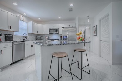 This is a WOW TURNKEY HOME!  New roof and HVAC in 2020.  Totally on The Links of Spruce Creek in Florida - for sale on GolfHomes.com, golf home, golf lot