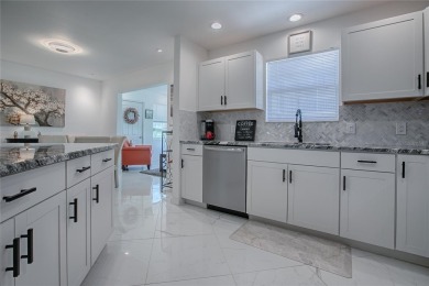 This is a WOW TURNKEY HOME!  New roof and HVAC in 2020.  Totally on The Links of Spruce Creek in Florida - for sale on GolfHomes.com, golf home, golf lot