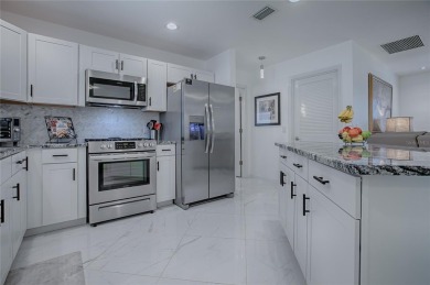 This is a WOW TURNKEY HOME!  New roof and HVAC in 2020.  Totally on The Links of Spruce Creek in Florida - for sale on GolfHomes.com, golf home, golf lot
