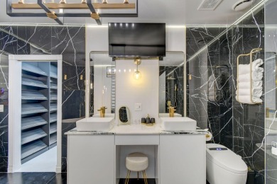 Contemporary renovation just completed on this well located on The Wanderers Club in Florida - for sale on GolfHomes.com, golf home, golf lot