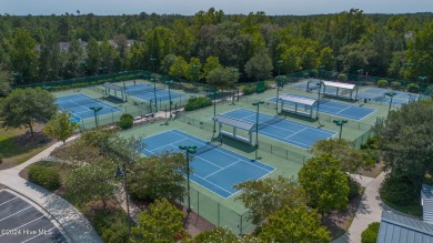 Nestled in the highly sought-after Brunswick Forest community on Cape Fear National At Brunswick Forest in North Carolina - for sale on GolfHomes.com, golf home, golf lot