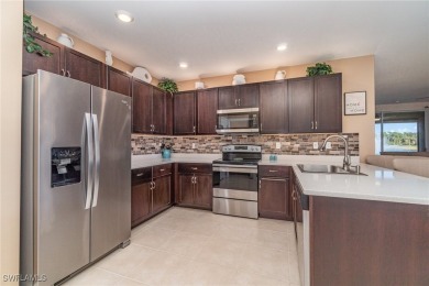 TURNKEY with golf cart included ~ A MUST SEE!  Imagine waking up on Herons Glen Golf and Country Club in Florida - for sale on GolfHomes.com, golf home, golf lot
