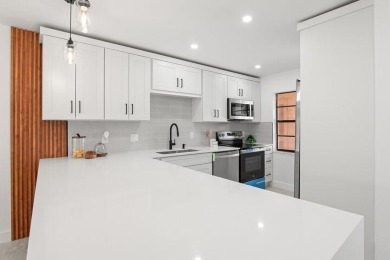 Stunning renovated 1st floor 2/2 condo overlooking beautiful on Boca Lago Golf and Country Club in Florida - for sale on GolfHomes.com, golf home, golf lot