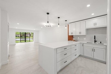 Stunning renovated 1st floor 2/2 condo overlooking beautiful on Boca Lago Golf and Country Club in Florida - for sale on GolfHomes.com, golf home, golf lot