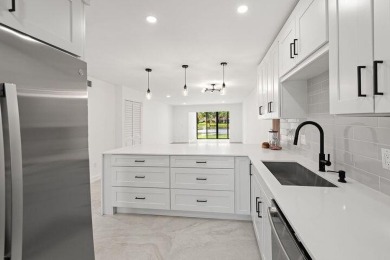 Stunning renovated 1st floor 2/2 condo overlooking beautiful on Boca Lago Golf and Country Club in Florida - for sale on GolfHomes.com, golf home, golf lot