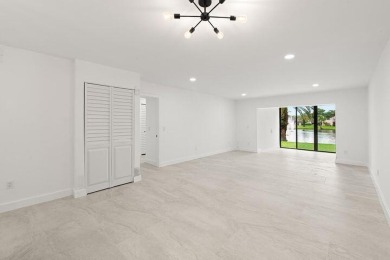 Stunning renovated 1st floor 2/2 condo overlooking beautiful on Boca Lago Golf and Country Club in Florida - for sale on GolfHomes.com, golf home, golf lot