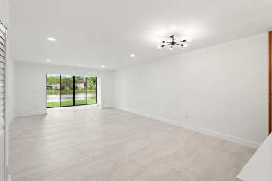 Stunning renovated 1st floor 2/2 condo overlooking beautiful on Boca Lago Golf and Country Club in Florida - for sale on GolfHomes.com, golf home, golf lot