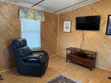 MOVE-IN READY, FURNISHED PROPERTY FOR LESS THAN $100K.  This on River Ridge Golf Club in Virginia - for sale on GolfHomes.com, golf home, golf lot