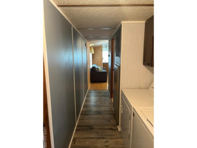 MOVE-IN READY, FURNISHED PROPERTY FOR LESS THAN $100K.  This on River Ridge Golf Club in Virginia - for sale on GolfHomes.com, golf home, golf lot