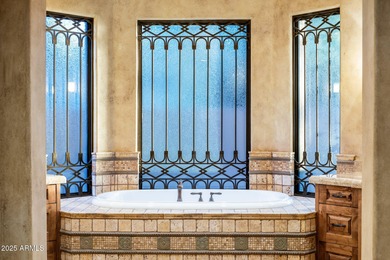 Welcome to a custom-built residence that epitomizes classic on Troon Country Club in Arizona - for sale on GolfHomes.com, golf home, golf lot