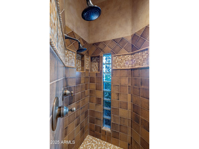 Welcome to a custom-built residence that epitomizes classic on Troon Country Club in Arizona - for sale on GolfHomes.com, golf home, golf lot