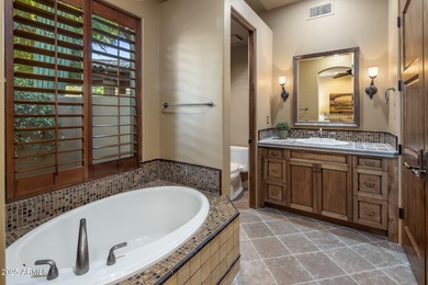 Welcome to a custom-built residence that epitomizes classic on Troon Country Club in Arizona - for sale on GolfHomes.com, golf home, golf lot