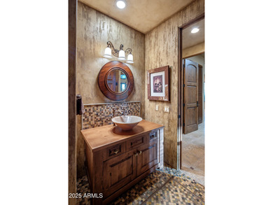 Welcome to a custom-built residence that epitomizes classic on Troon Country Club in Arizona - for sale on GolfHomes.com, golf home, golf lot