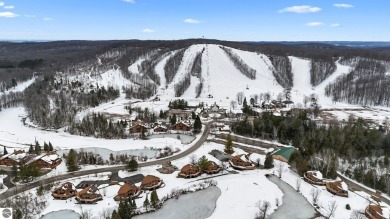 This delightful condo at Schuss Mountain Village in Shanty Creek on Schuss Mountain Golf Club in Michigan - for sale on GolfHomes.com, golf home, golf lot