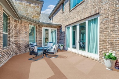 This STUNNING home is located in The Tribute- a premier golf on The Tribute At the Colony in Texas - for sale on GolfHomes.com, golf home, golf lot