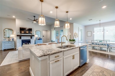 This STUNNING home is located in The Tribute- a premier golf on The Tribute At the Colony in Texas - for sale on GolfHomes.com, golf home, golf lot